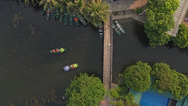 Aerial view of tourists boating on river in tam coc vietnam
