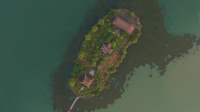 Aerial top down rotating view of hoa lu pagoda at sunrise in vietnam