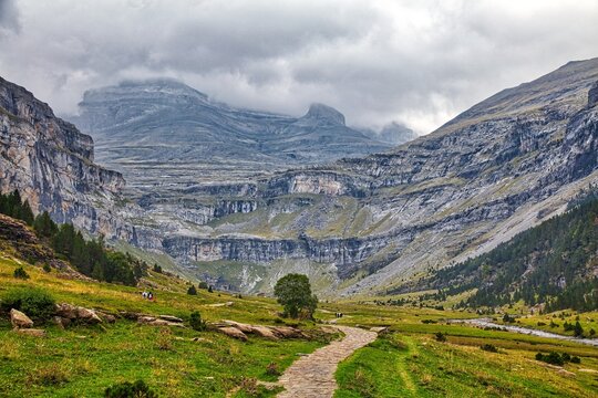 Hiking trail in Spain. Ordesa valley in Spanish Pyrenees. Glacial cirque of Ordesa y Monte Perdido National Park.