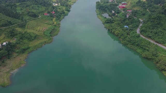 Aerial drone flying over river valley in bac me vietnam