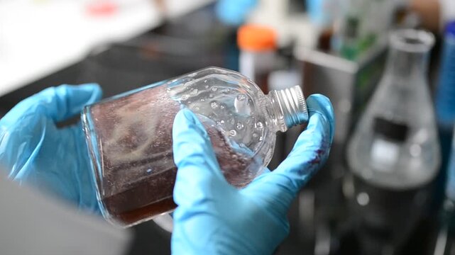 Science, laboratory and woman with pipette, test tube and biotech solution in research. Medical innovation, scientist or lab technician in study for healthcare, medicine and vaccine results feedback.