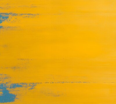 Distressed yellow wooden texture with teal undertones showing through the paint, ideal for backgrounds or design projects