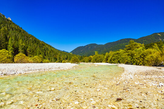 Pisnica River near Kranjska Gora, Slovenia &ndash; Clear Alpine River and Forested Julian Alps