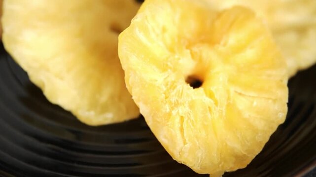 Dried pineapple slice sweet dried fruit serving size natural ingredients healthy eating, wholesome tasty snack fresh, gourmet, rustic food background on the table top view copy space keto and paleo di