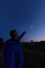 Amateur astronomer observing stars, planets and other celestial objects. © astrosystem