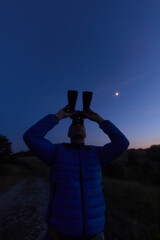 Amateur astronomer observing stars, planets and other celestial objects. © astrosystem