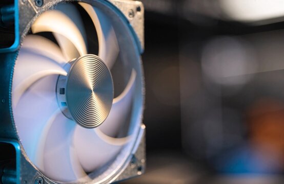 A spinning computer cooling fan operating inside a powerful desktop PC workstation system