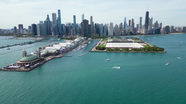 drone following boat on lake michigan in front of chicago skyline on a bright summer day