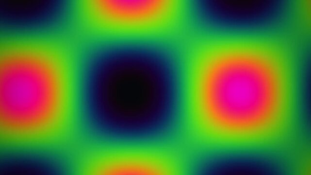 Abstract pixelated grid of changing colorful gradients creates a dynamic and modern looping motion background.