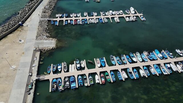 Aerial View of Marina Harbor with Boats and Yachts in Turquoise Sea Water