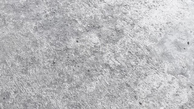 Rough concrete surface texture with abstract grey patterns