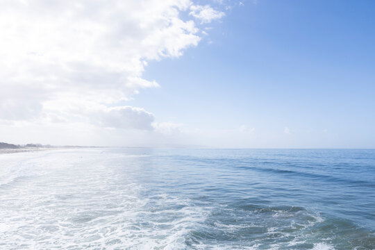 View of Pacific Ocean with blue skies and some clouds