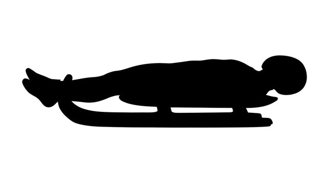 Person sliding face down on a skeleton sled for winter sports activity