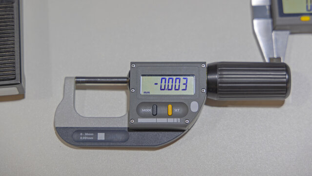 Digital Micrometer Precise Measuring Device at Work Desk