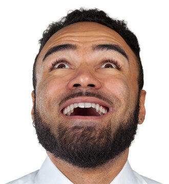 Smiling man looking up with joy in a brightly lit setting