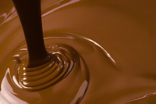 swirl stream chocolate, liquid sauce or sweet cocoa syrup