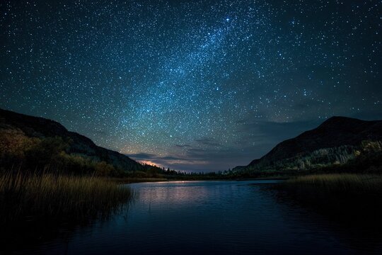 night kayaking under a sky full of stars
