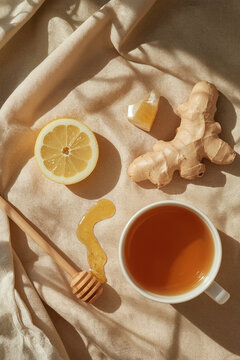 Healthy immune boosting concept with ginger lemon tea, honey and mint leaves for winter wellness remedies
