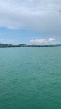 Balaton lake in Hungary with scenic views of the shoreline.