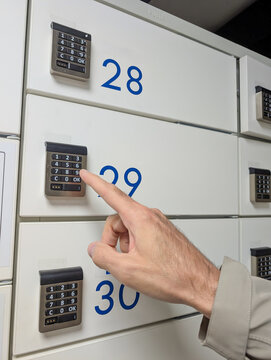Receiving a package at the automated parcel terminal. Selective focus
