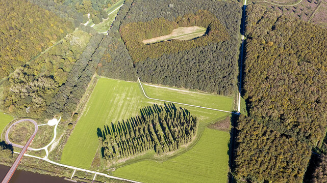 Aerial view of The Green Cathedral, a land art project by Marinus Boezem featuring poplar trees planted in the shape of a cathedral floor plan in Almere, Flevoland, Netherlands.