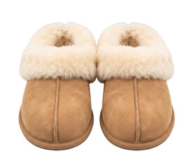 Pair of tan suede house slippers with plush cream shearling cuffs isolated on black © Vova7