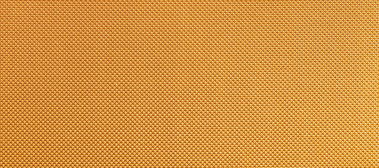 Full frame view of bright orange embossed rubber surface material with geometric diamond pyramid mesh texture for abstract wallpaper stock photo © moryachka