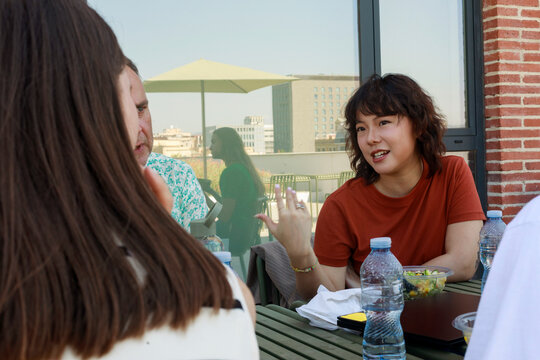 People Talk and Eat During lunch time