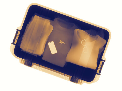X-ray View of Cotton Clothes in a Suitcase at Airport Security
