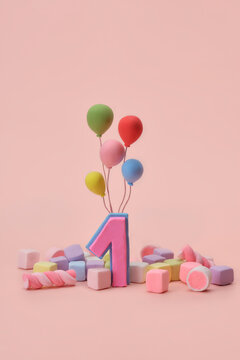 Colorful birthday celebration for a one year old with balloons