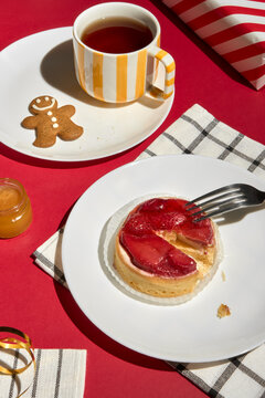 Partly Eaten Tasty Strawberry Tart With Fork On A Festive Dining Table