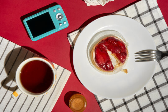 Festive Still Life. Tart, Tea and a Blue Camera For Pleasant Memories
