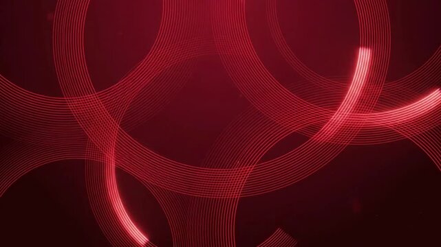 Futuristic red neon rings overlapping with a bright glowing light beam in this abstract technology 3d render motion graphic loop.

