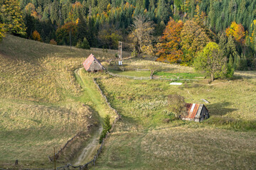 old wooden shepherd huts in a Pieniny meadow © lumofoto