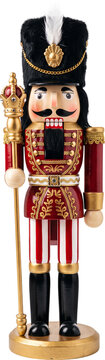 Traditional Christmas wooden nutcracker soldier figurine with scepter, isolated on white background