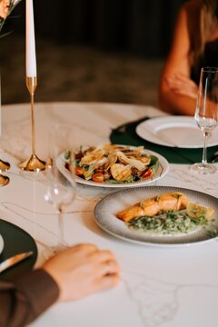 Fine dining: gourmet salmon and fresh garden salad dinner