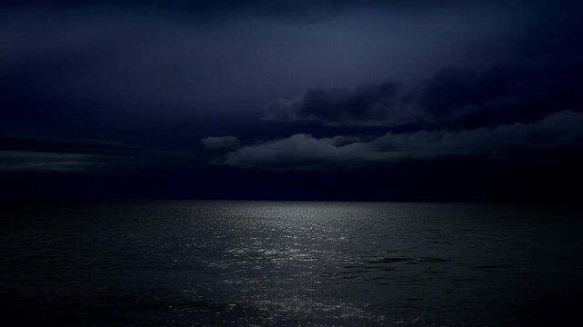 Storm clouds shift above a dark ocean as lightning flashes and waves ripple