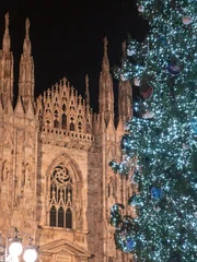 Milan, Italy. December 06, 2025, Milan Duomo square celebrating Christmas with tree lights © tanaonte