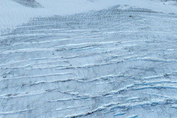 Aerial View of Layered Glacier Ice and Crevasses on a Remote BC Canada Mountain Glacier © edb3_16