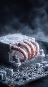 Frozen octopus tentacles emerging from a computer motherboard. Artificial intelligence and cybersecurity concept. Computer hardware failure, system cooling and technology security.