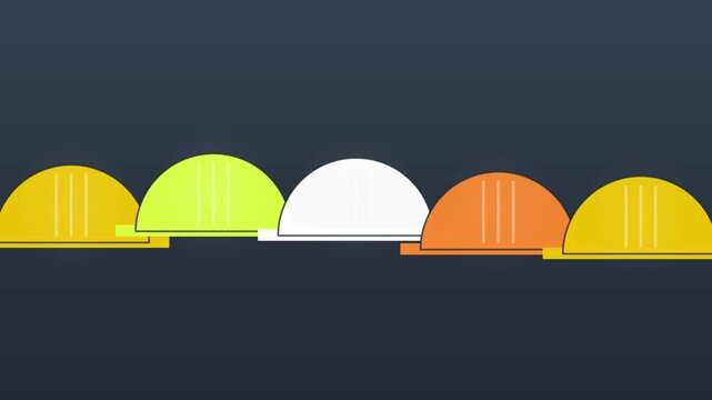 A row of safety helmets bobbing on a slate ground
