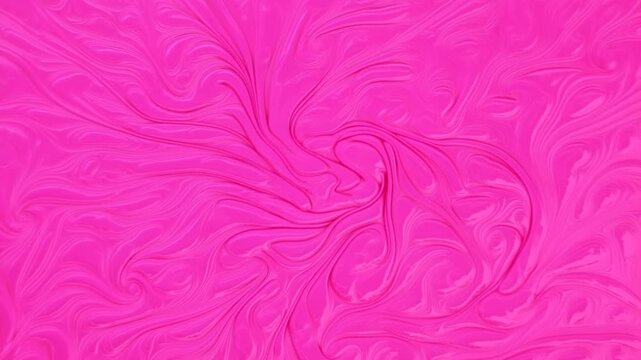 Pink marbled pattern with flowing swirls across an abstract fullframe background