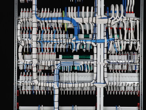  reverse side of the electrical switchboard. The connected wires are tied with plastic ties.