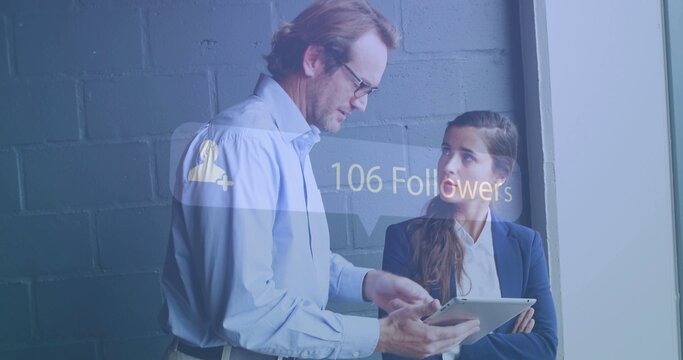 Showing manager  and  coworker discussing tablet near office window in workwear with 106 follower ba