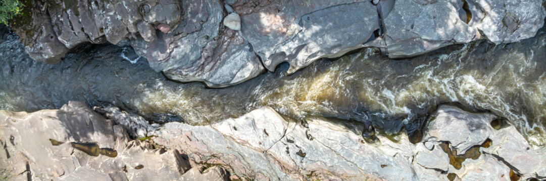 Aerial view of Estrecho del Rio Magdalena showing the narrow river channel flowing through rugged rock formations in San Agustin, Huila, Colombia.