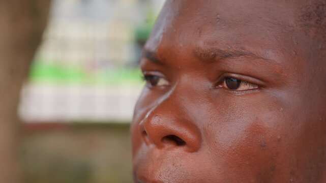 Shots focus on facial features and textures of adult male subject. sequence shows gradual movement across different angles emphasizing natural skin details like pores and hair