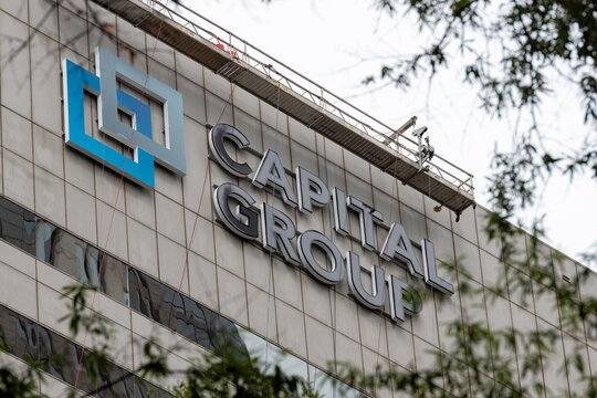 Capital Group East Coast hub in Charlotte, NC installs signage on One Independence Center in uptown Charlotte, NC