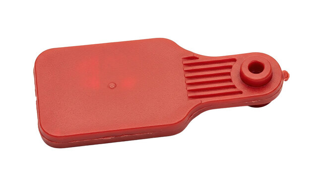 Red plastic security tag with removal pin for retail products