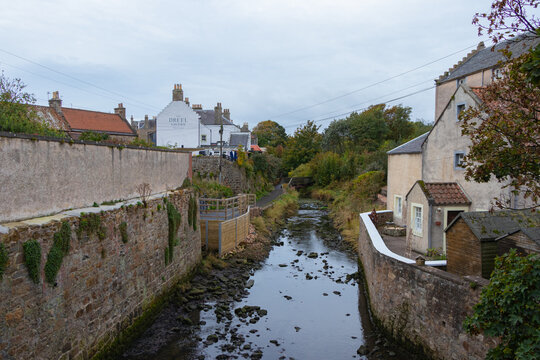 Traditional canal and historic stone buildings along the Drail burn in Anstruther, Fife, Scotland