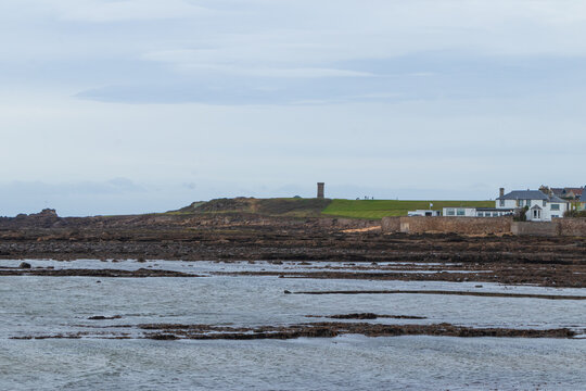 Anstruther War Memorial tower standing on the coastal golf course overlooking the sea in Fife, Scotland